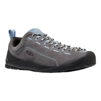 A gray suede hiking shoe with black rubber sole, gray laces, and light blue accents on the tongue, heel tab, and eyelets, shown against a plain white background.