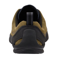 Back view of a brown and black sneaker on a white background