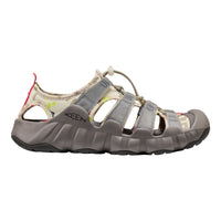 A Keen brand athletic sandal in gray and beige with a small multicolor pattern on the side, shown from a side profile against a white background.