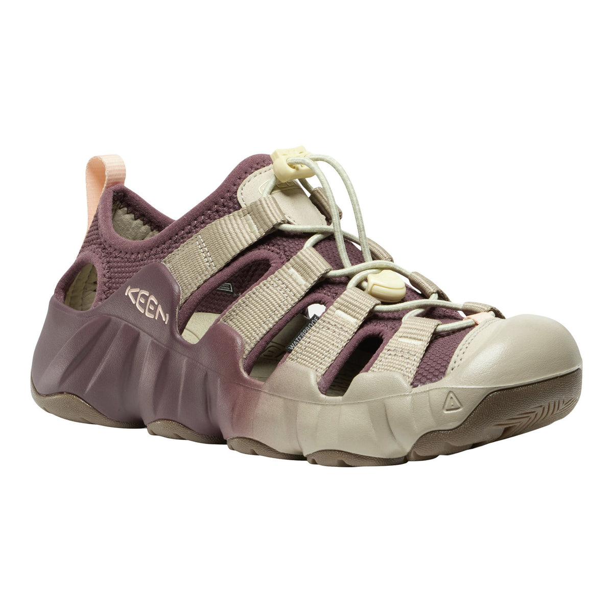 A Keen water shoe in a muted plum purple and beige colorway, featuring adjustable straps, a protective toe cap, and a thick textured sole, shown against a plain white background.