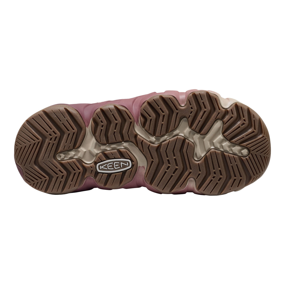 The outsole of a Keen hiking boot in dusty rose pink and brown, showing the tread pattern and the Keen logo on a white background.