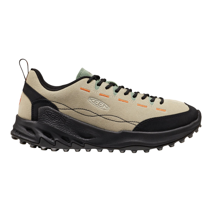 A Keen brand trail shoe in beige suede and black synthetic materials, featuring black laces, orange stitching accents, and a rugged black sole, shown against a plain white background.
