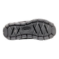 The textured black rubber outsole of a shoe, showing the tread pattern and embossed KEEN branding, isolated on a white background.