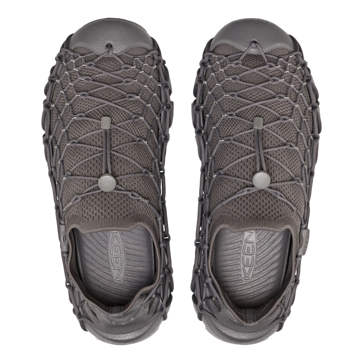 A pair of gray KEEN sandals with integrated woven mesh and rope laces, shown from a top-down view on a white background.