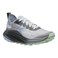 A single athletic running shoe shown in a three-quarter side view on a plain white background. The shoe features a light gray and blue knit upper, a dark gray midsole, and a light green outsole.