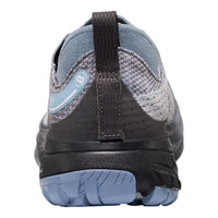 A close-up rear view of a KEE trail running shoe in slate blue, gray, and black, showing the heel, pull tab, and textured sole.