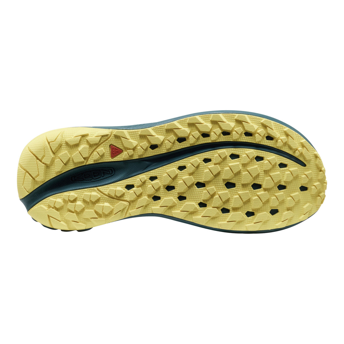 The textured outsole of a trail running shoe, featuring a pale yellow tread with a dark teal central channel and a small red logo accent.