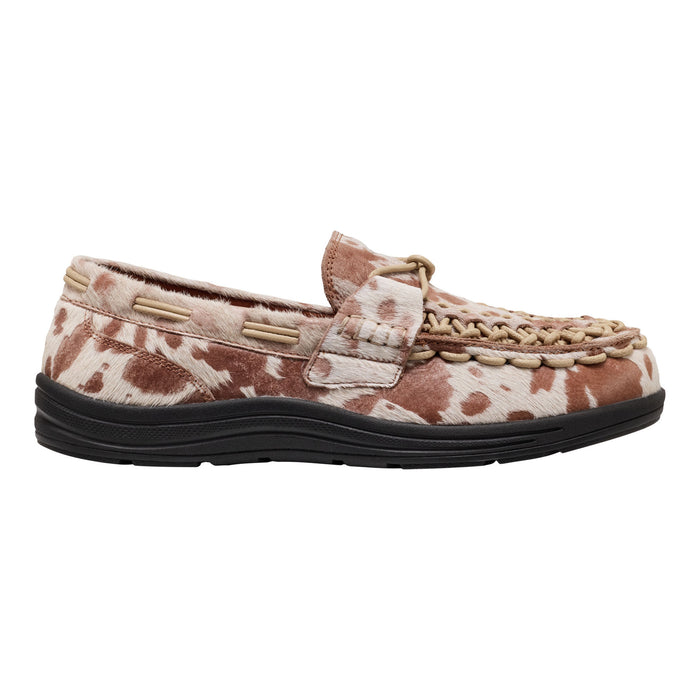 A single slip-on loafer-style shoe with a brown and cream cowhide pattern, a braided tan strap across the top, and a black sole, shown against a plain white background.