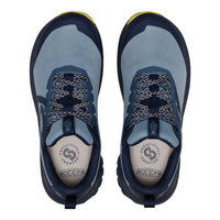 A pair of KEEN brand athletic shoes shown from a top-down view. The shoes feature a light blue mesh upper with navy blue overlays, navy laces, and a white insole with the KEEN logo.