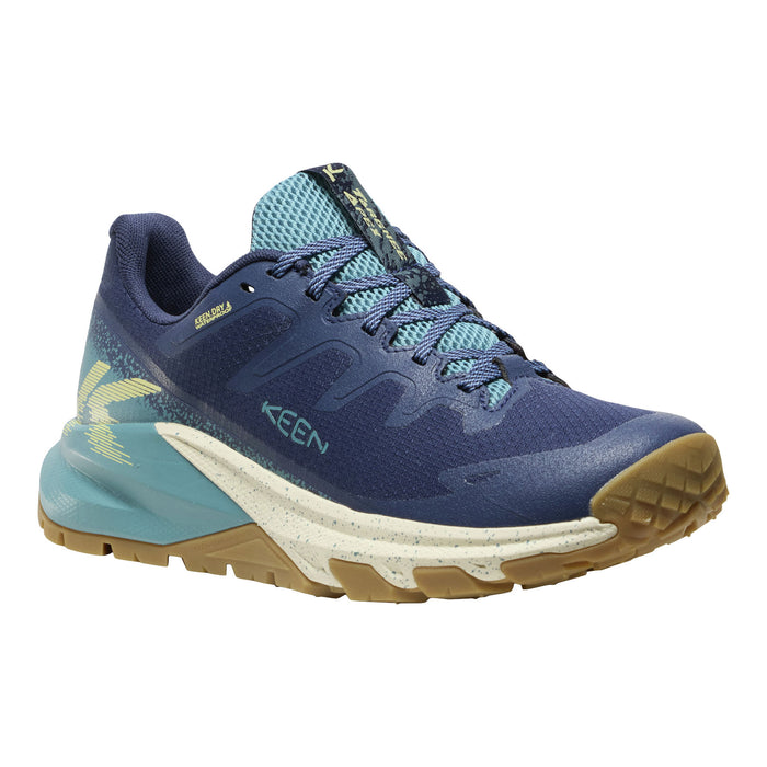 A Keen trail shoe in navy blue with light blue accents, a white midsole, and a brown outsole, shown from a three-quarters angle on a white background.