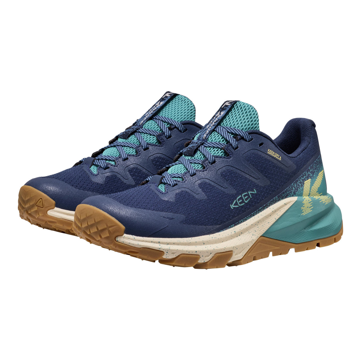 A pair of KEEN trail shoes in navy blue with teal accents and a brown outsole, shown on a plain white background.
