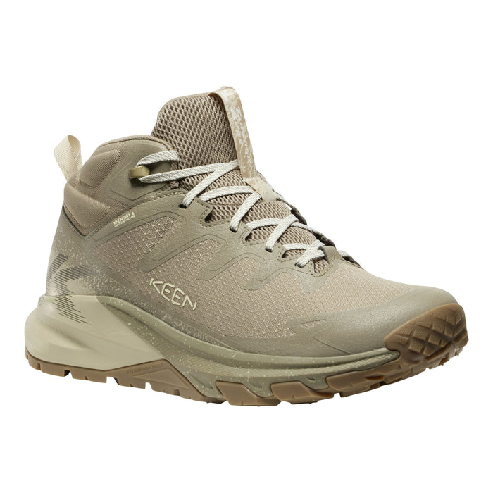 A Keen mid-cut hiking boot in a light taupe/beige colorway, featuring a textured mesh upper, lace-up closure, and a rugged sole, shown against a plain white background.