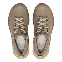 A pair of beige mesh athletic sneakers shown from a top-down view on a white background.