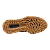 The textured brown rubber outsole of a Keen shoe, showing the brand name embossed in the center, photographed on a solid white background.