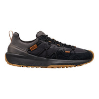 A black and dark gray outdoor sneaker with brown accents, including a brown heel pull tab, a small brown brand patch on the side, and a brown outsole, shown from a side profile view against a white background.
