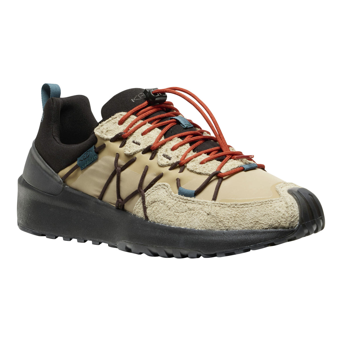 A low-top outdoor shoe in beige and black with rust-orange laces and small blue accents, shown on a plain white background.