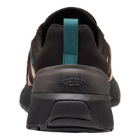 A close-up rear view of KEEN athletic shoe in black with a teal pull tab and subtle tan side accents, set against a plain white background.
