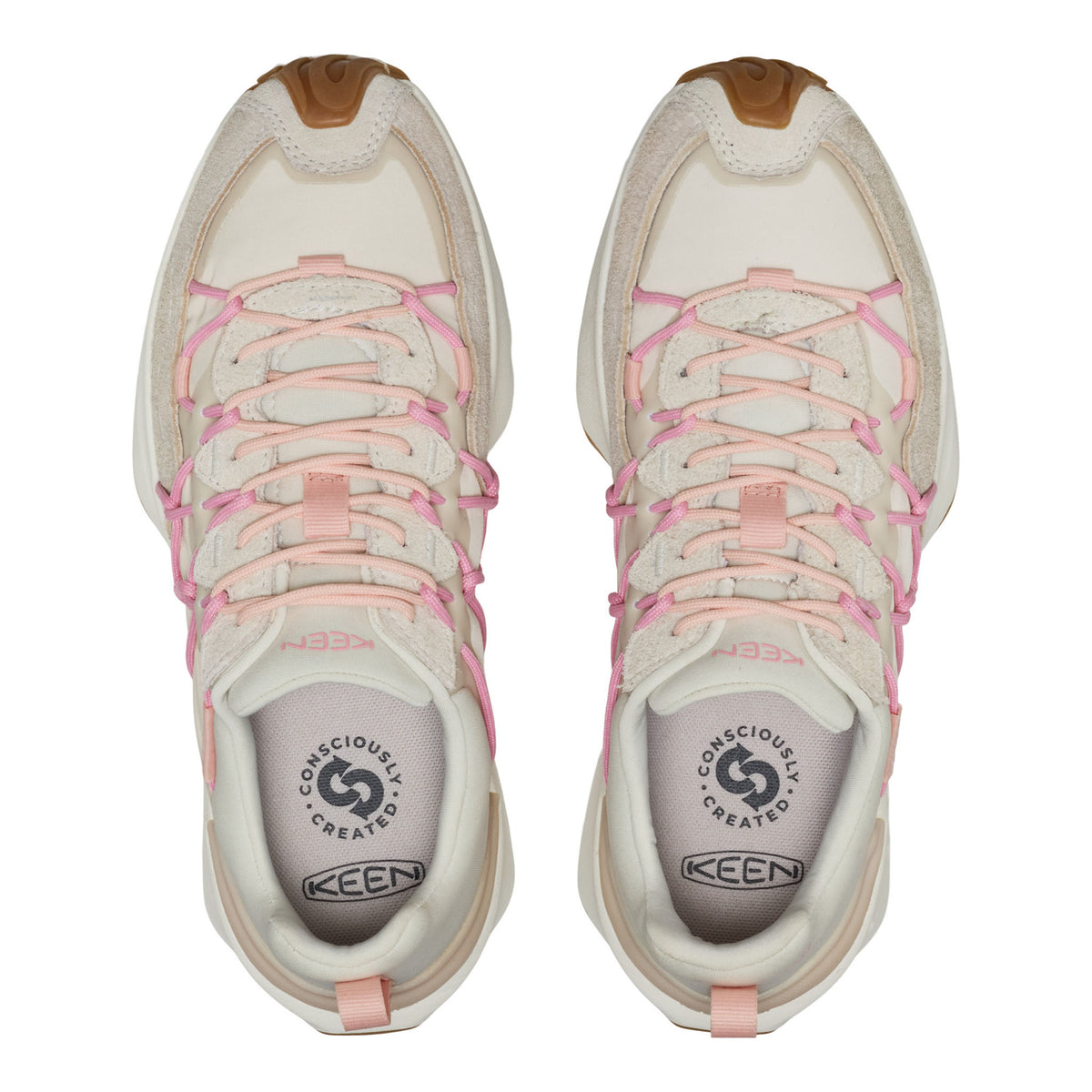 A pair of KEEN brand chunky sneakers shown from a top-down view. The shoes feature a cream-colored suede and mesh upper with light pink elastic laces and a brown leather toe cap.