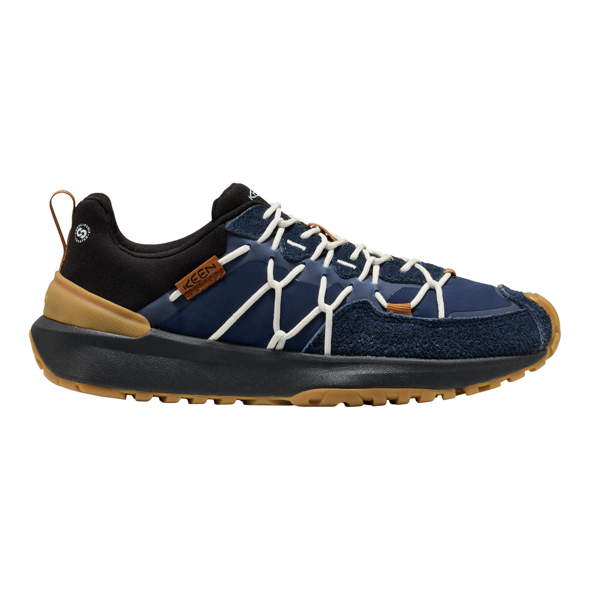 A single low-top outdoor shoe shown in profile against a plain white background. The upper is primarily navy blue with a black collar and tongue area, white crisscross laces, tan/gum outsole and heel accent, and a small brown brand patch.