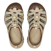 A pair of Keen Sandals Classic II water shoes shown from a top-down view on a white background. The sandals feature a beige mesh upper with sage green and dark brown straps, beige laces, and a dark brown toe cap.