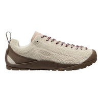 A single low-top shoe shown in side profile on a plain white background. The upper is a textured cream/off-white knit or boucle-like material, with medium brown overlays around the heel and toe, matching brown laces, and a brown outsole.