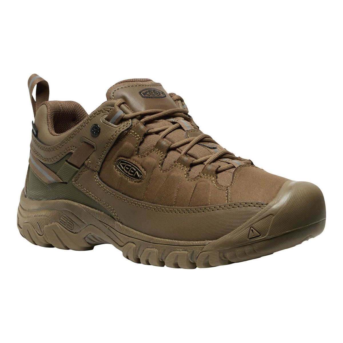 A single Keen brand hiking shoe in a warm brown/tan colorway, shown from a three-quarters angle against a plain white background.