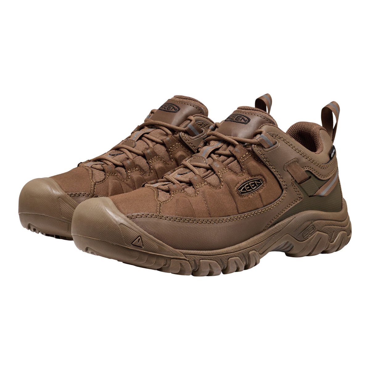 A pair of brown Keen hiking shoes with matching laces and rugged soles, shown from a three-quarters angle on a plain white background.