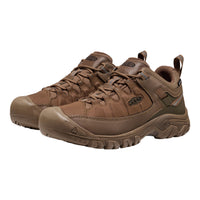 A pair of brown Keen hiking shoes with matching laces and rugged soles, shown from a three-quarters angle on a plain white background.