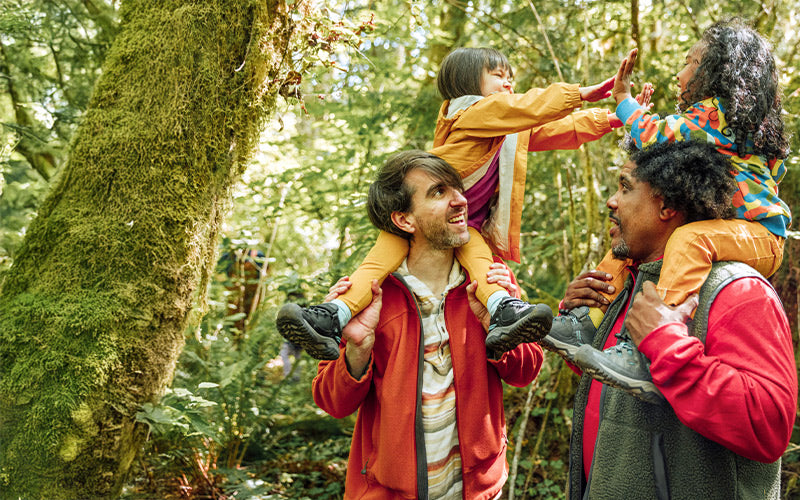 Family with a child in a forest setting