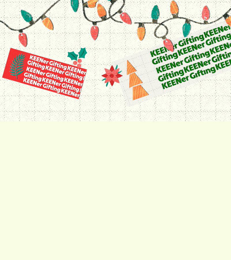 Decorative envelope with Christmas lights and 'KEENer Gifting' text on a white background