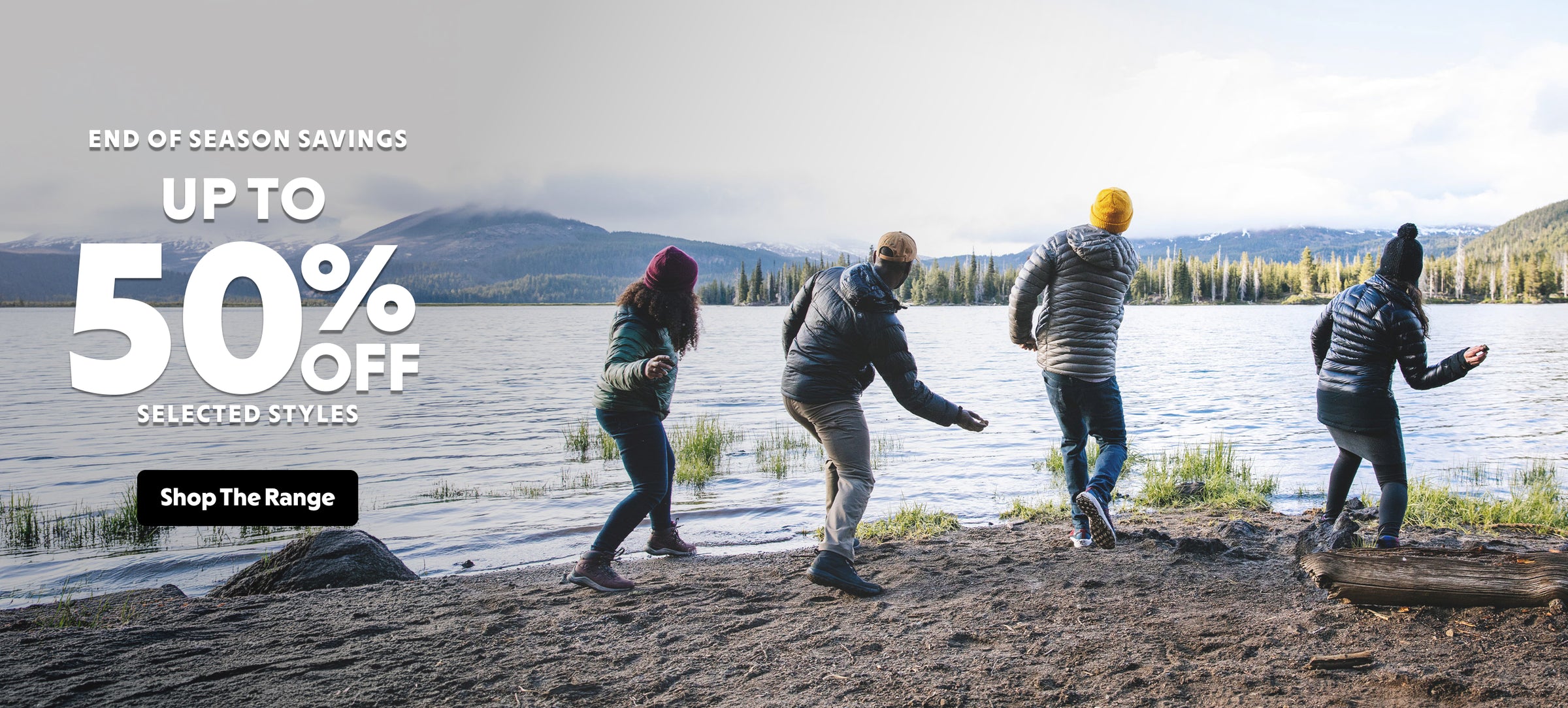 Group of people walking by a lake with promotional text for end-of-season savings.