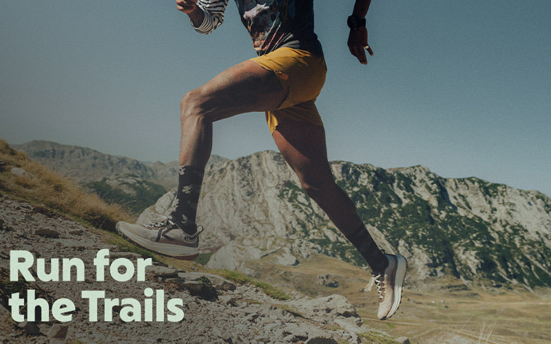 Person running on a mountain trail with 'Run for the Trails' text.